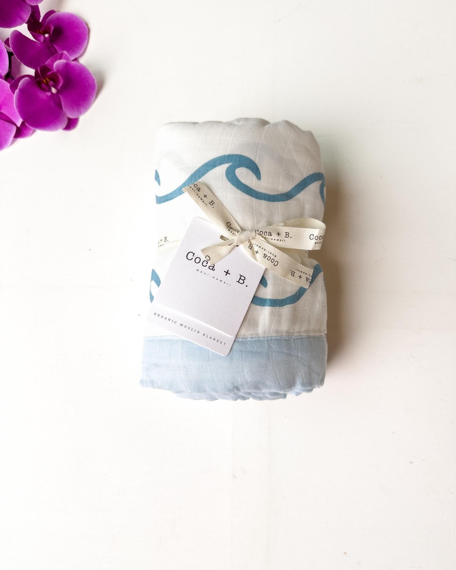 Endless Wave – Blue Trim | 6-Layer Organic Bamboo Muslin Baby Blanket - Coca + B.