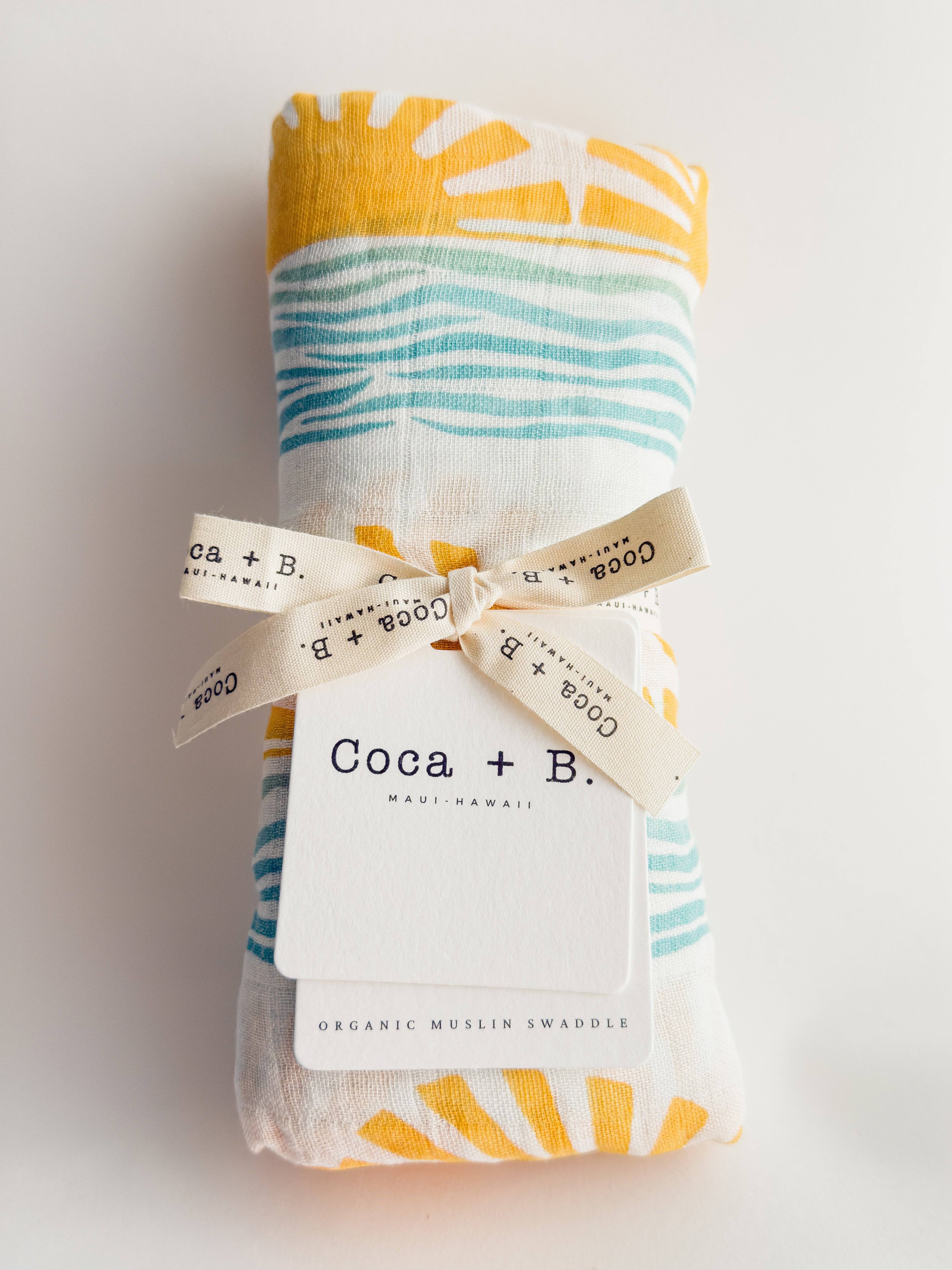 sun and ocean wave print surfer baby swaddle wrapped from maui