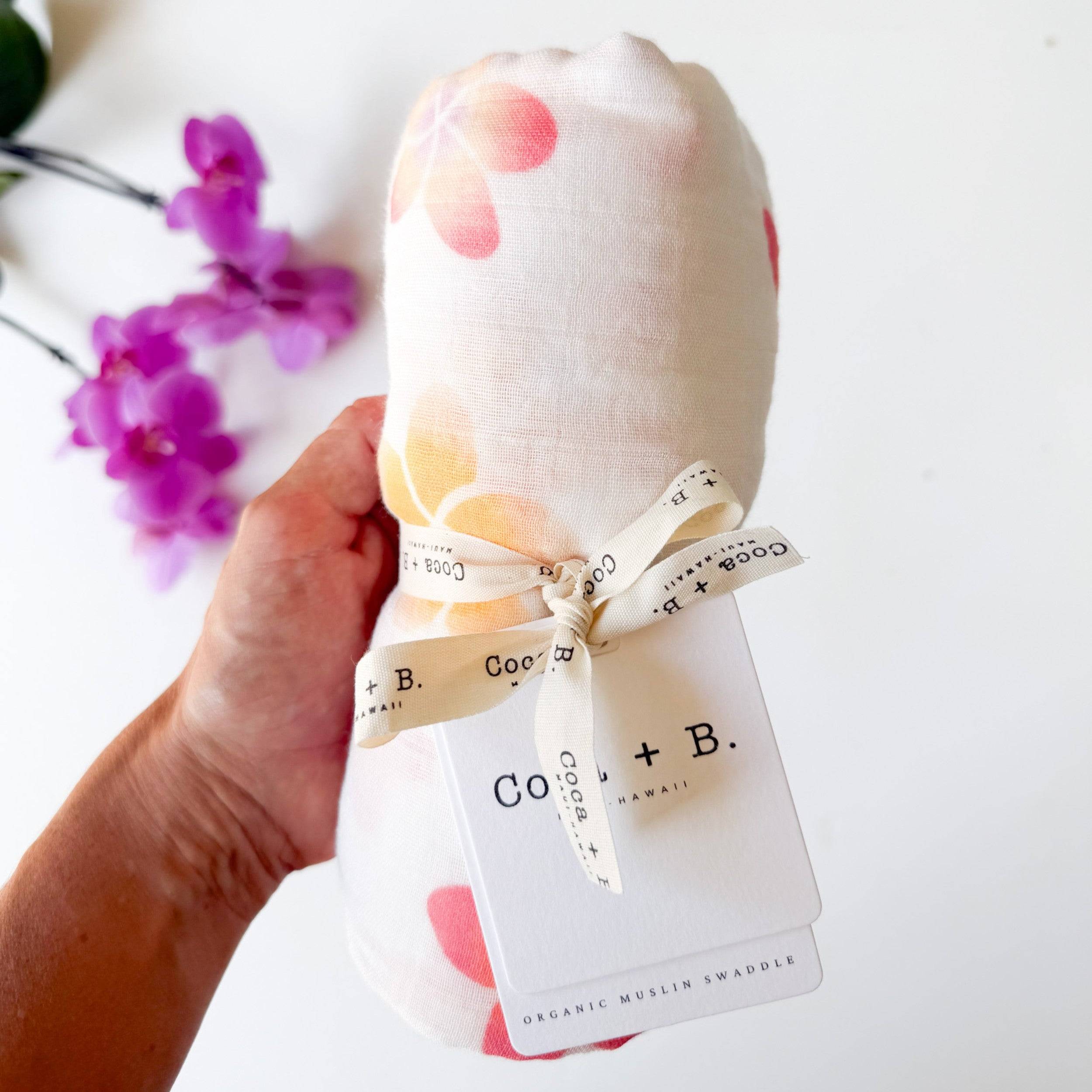 organic hawaii flower print bamboo muslin swaddle
