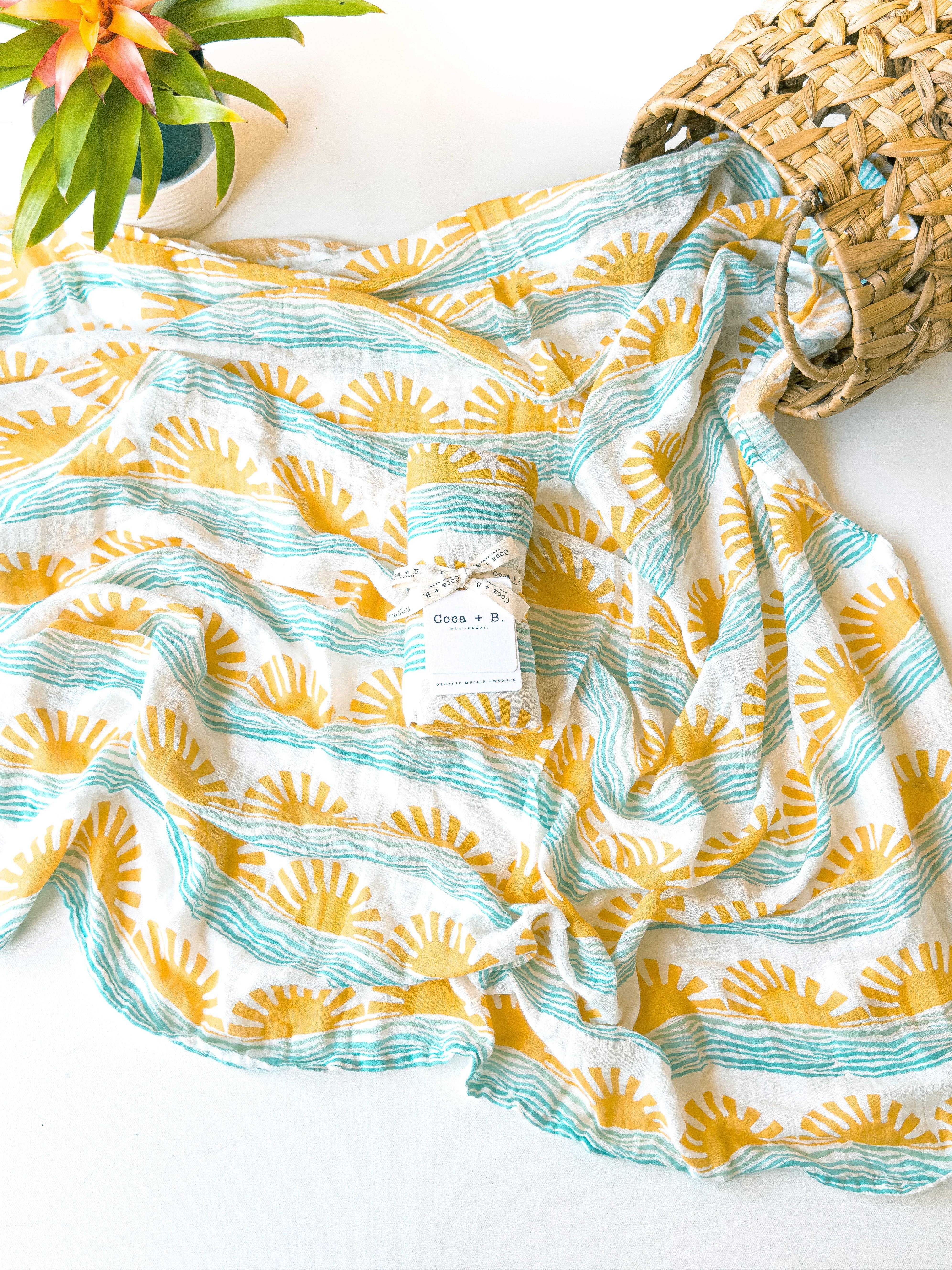 sun and ocean wave print surfer baby swaddle