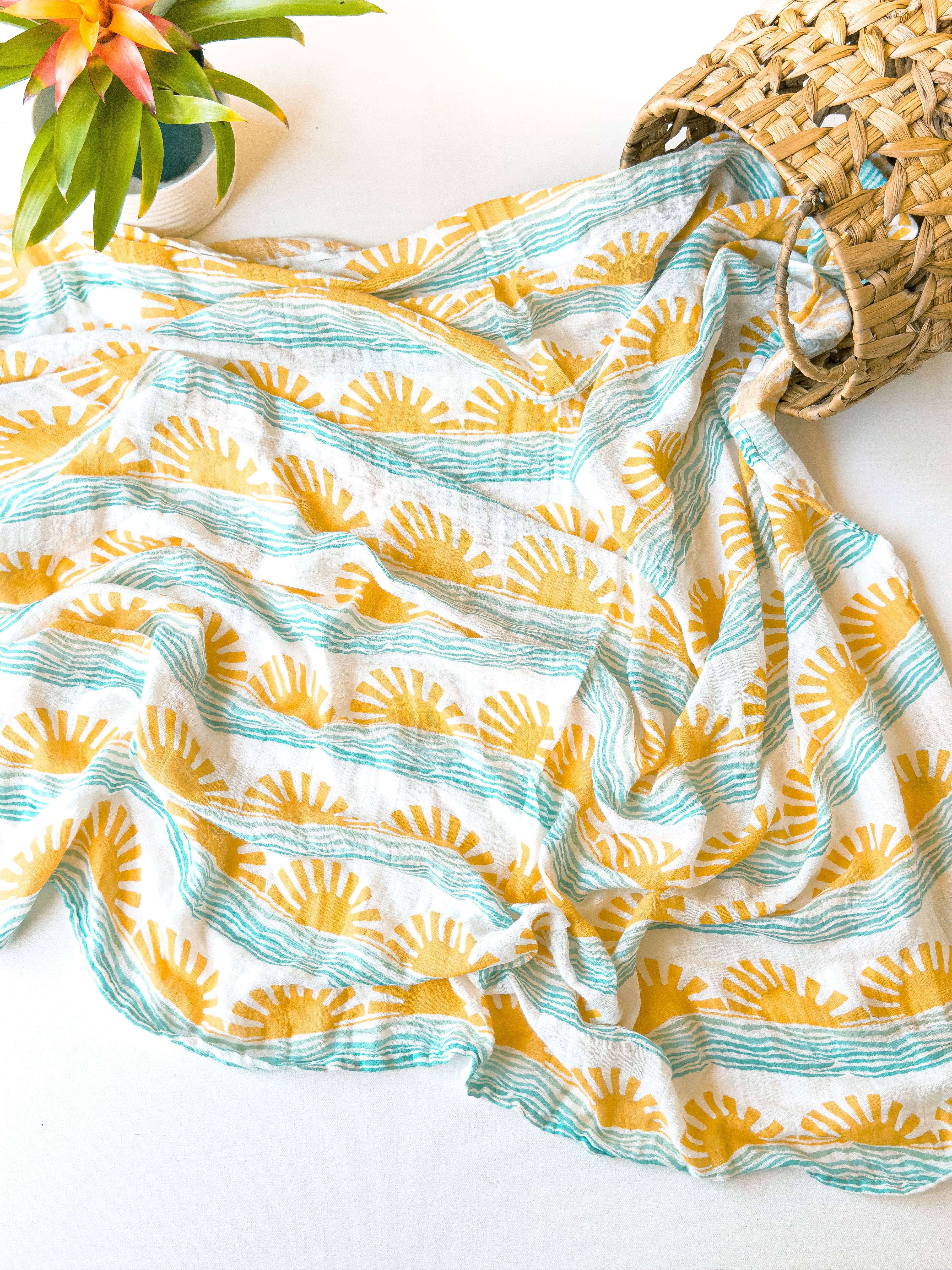sun and ocean wave print surfer baby swaddle