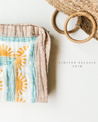 Blue Sun + Wave – Sand Trim | 6-Layer Organic Bamboo Baby Blanket - Coca + B.